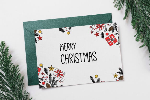 a greeting card with "Merry Christmas" written on it